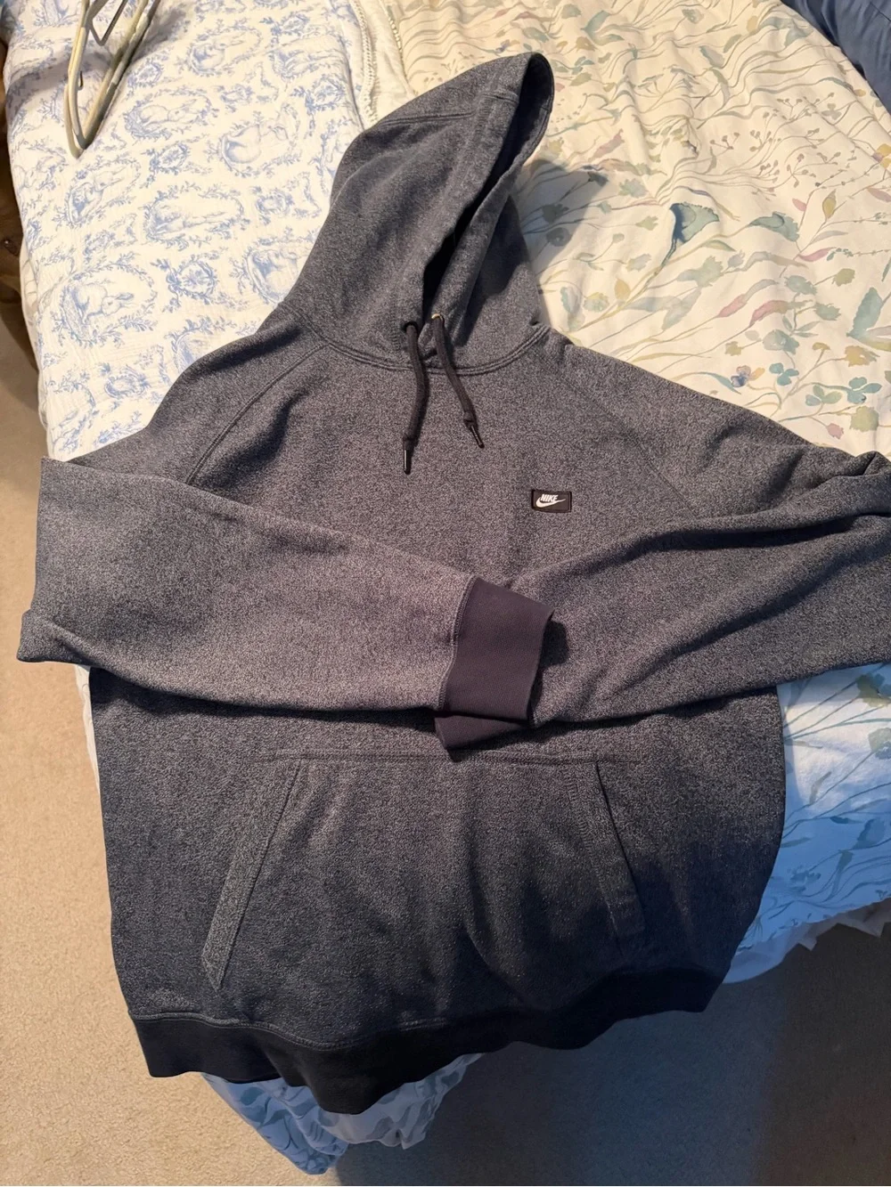 Nike Sportswear Heathered Knit Pullover Hoodie.